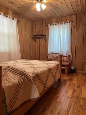 The relaxing bedroom of the cabin.